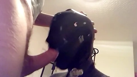 Latex Hooded Cock Sucker